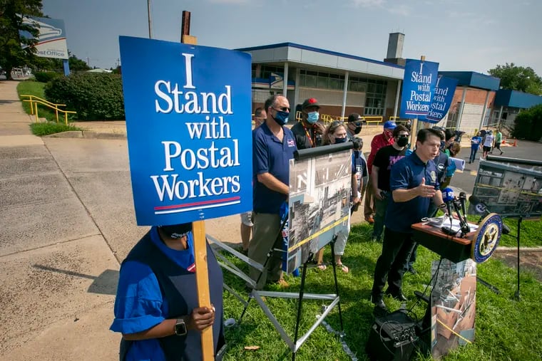U.S. Rep. Brendan Boyle (D., Pa.) speaks in support of postal workers and the U.S Postal Service in Northeast Philadelphia on Tuesday.