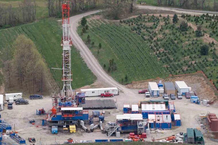 Natural gas drilling operations, such as this one in Chartiers Township, Washington County, have proliferated in the Marcellus Shale formation in Pennsylvania. Gov. Corbett wants to expand them to state forests, prisons, and colleges.