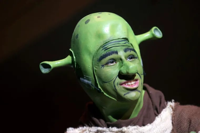 Sam Sobel plays Shrek in the musical at Collingswood High School. The school made one performance sensory-friendly and invited students from area schools on Friday March 27, 2015. ( DAVID SWANSON / Staff Photographer )
