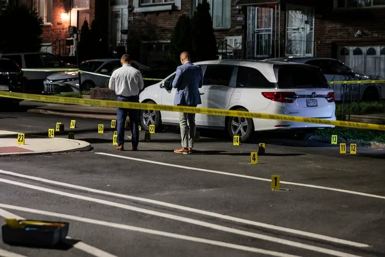 Police on the scene of a double shooting in North Philadelphia. An 8-year-old girl was hospitalized in stable condition with a graze wound to her head. Thursday, Sept. 22, 2022.