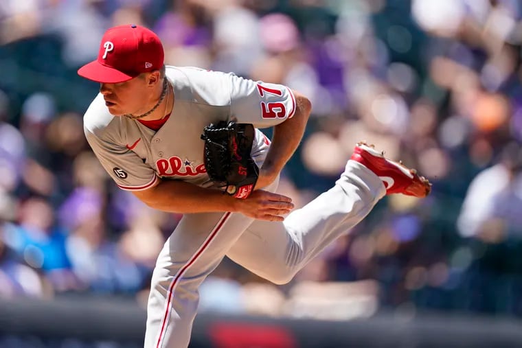Philadelphia Phillies starting pitcher Chase Anderson works the Colorado Rockies in the first inning of a baseball game Sunday, April 25, 2021, in Denver. (AP Photo/David Zalubowski)
