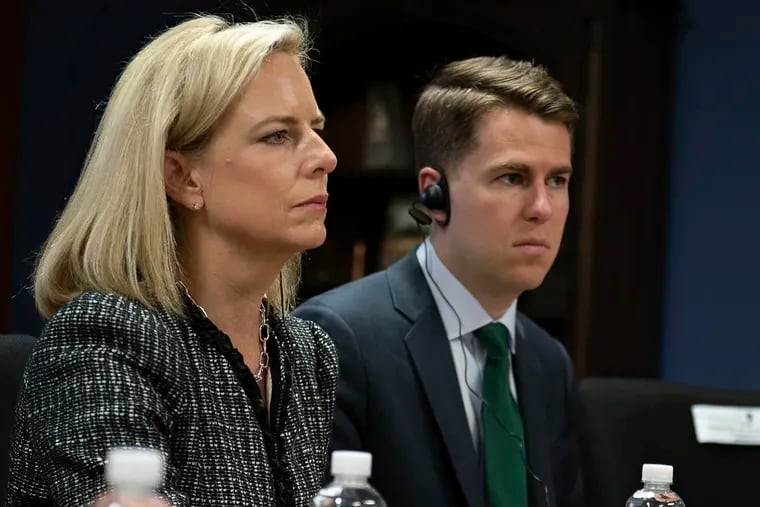 This March 27, 2018, provided by the Department of Homeland Security, then-Secretary of Homeland Security Kirstjen Nielsen and then-Department of Homeland Security chief of staff Miles Taylor, right, meet with Honduran President Juan Hernandez, not pictured, and security ministers from the Northern Triangle countries in Tegucigalpa, Honduras. Taylor, a former Trump administration official who penned a scathing anti-Trump op-ed and book under the pen name “Anonymous” made his identify public Wednesday.