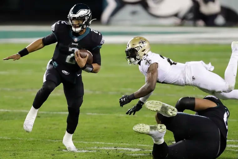 Eagles QB Jalen Hurts rushed for over 100 yards in Sunday's 24-21 win, keeping the Saints defense on its toes in his first career start.