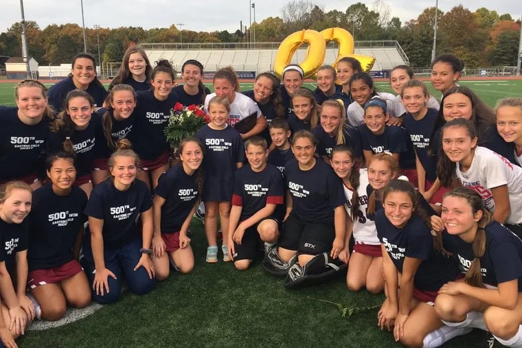 Eastern field hockey coach Danyle Heilig and her team celebrate Heilig's 500th career win after Thursday's South Group 4 championship.