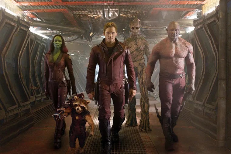 Chris Pratt (front) leads a ragtag band that includes Zoe Saldana (left) in &quot;Guardians of the Galaxy.&quot;