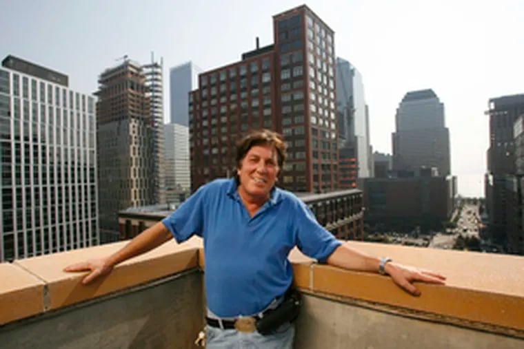 Tom Bulger on the roof of Stuyvesant High School, where he works, about four blocks from the World Trade Center. Go to http://go.philly.com/detox for an online exclusive on Bulger and three others who went through the detoxification program.
