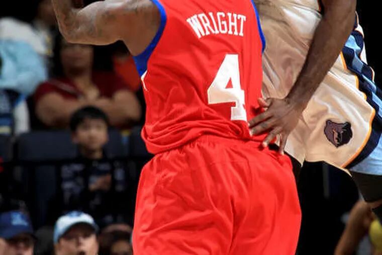Sixers forward Dorell Wright, who started in place of an ailing Jason Richardson, is fouled by Quincy Pondexter. Wright scored 28 points in the Sixers' 99-89 victory.
