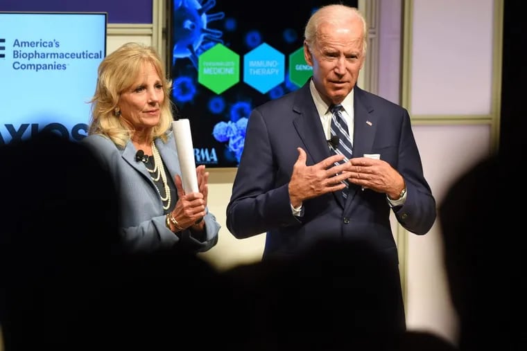 Former vice president Joe Biden and his wife Jill Biden stand as they finish a discussion of what the future of cancer will look like, as part of panel at the National Constitution Center November 8, 2017. They paused while leaving the stage to talk about their son, Beau Biden, who died of brain cancer in 2015. TOM GRALISH / Staff Photographer