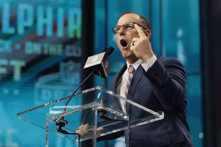 Former Eagles kicker David Akers on the podium in Dallas at the NFL draft.
