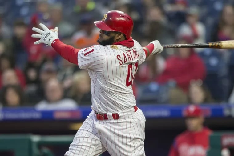 Philadelphia Phillies Carlos Santana won’t need to wear so many layers as the weather warms up. His bat is likely to warm up too.