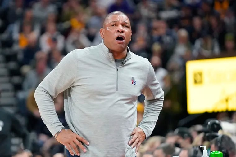 Philadelphia 76ers coach Doc Rivers watches during the first half of the team's NBA basketball game against the Utah Jazz on Tuesday, Nov. 16, 2021, in Salt Lake City. (AP Photo/Rick Bowmer)