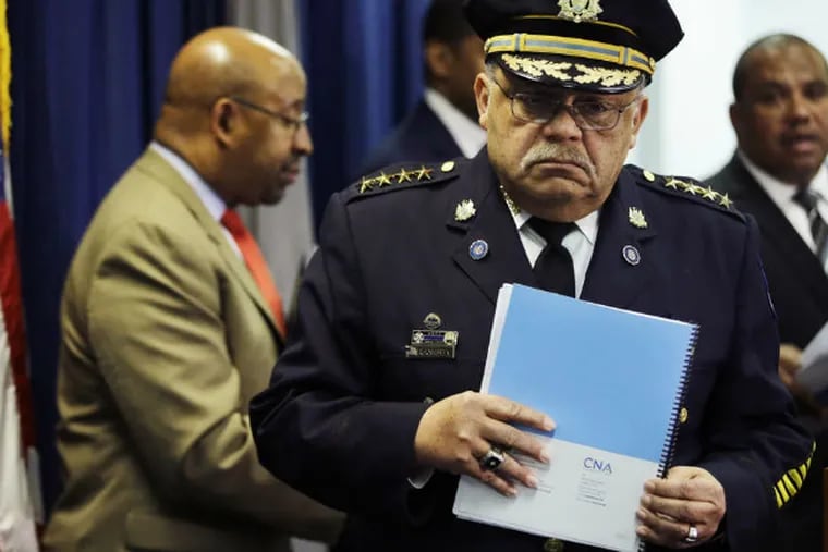 Police Commissioner Charles H. Ramsey presents the report from the U.S. Department of Justice, joined by Mayor Nutter (left). He pledged to move 'as quickly as we can' to come up with a plan to implement the recommendations.