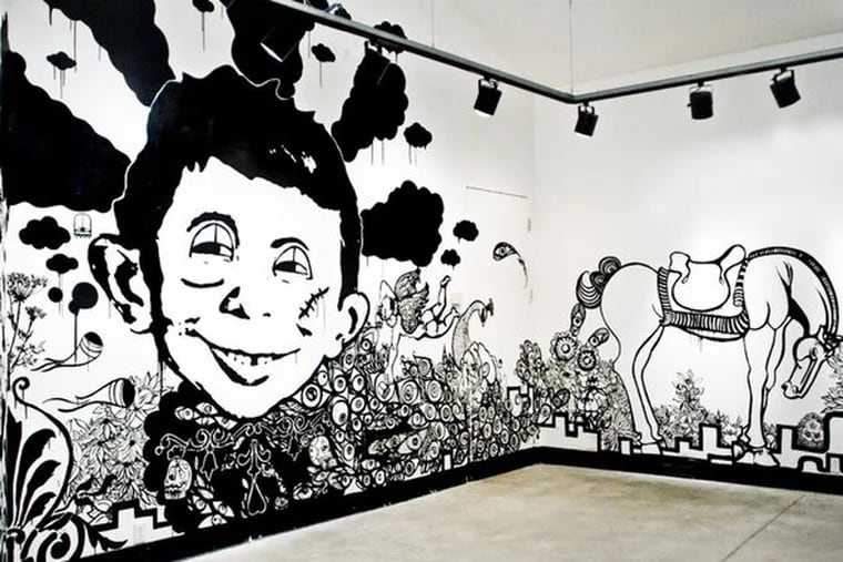 a black-and-white mural by Thomas Buildmore and Morgan Thomas, at Drexel's Leonard Pearlstein Gallery. The title combines &quot;semiotics,&quot; the study of signification, and the &quot;Panopticon,&quot; a type of prison design.