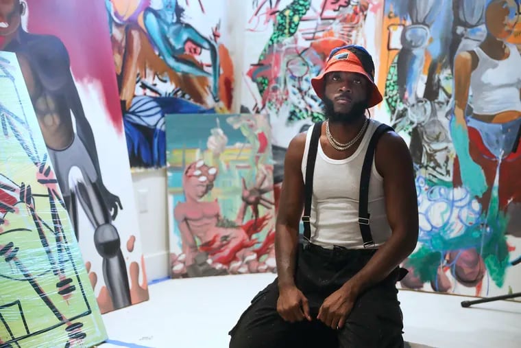 Gianni Lee pauses while showing pieces of his art in his Bushwick apartment in Brooklyn, NY on Tuesday, Sept. 22, 2020. Lee is a well-established artist from Philly.