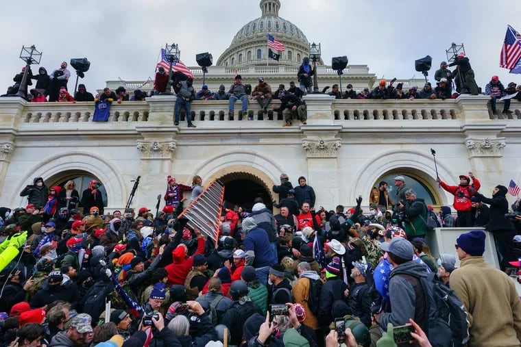 Trump supporters attack the capital building in Washington on Jan. 6, 2021.