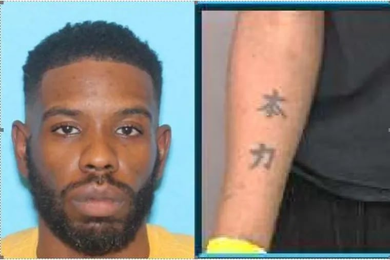 Police are seeking Akhenaton Jones, 36, of Powelton, in the killing of Dominique "Rem'mie" Fells, 27. He has Chinese characters tattooed on one of his arms.