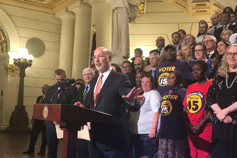 Gov. Tom Wolf speaks before signing into law a bill creating a state-based insurance exchange, which is expected to be operational by fall 2020.