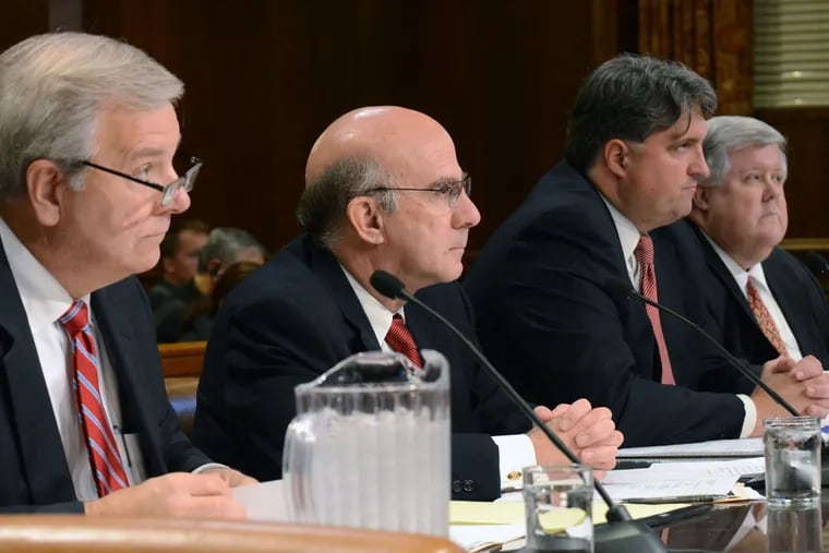 Four of Pennsylvania Attorney General Kathleen Kane's top deputies, from left, Lawrence Cherba, James A. Donahue III, Bruce R. Beemer and Robert A. Mulle, prepare to testify during a Senate committee hearing Wednesday, Nov. 18, 2015, in Harrisburg.