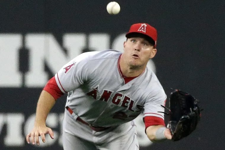 Angels center fielder Mike Trout makes a diving catch earlier this month.