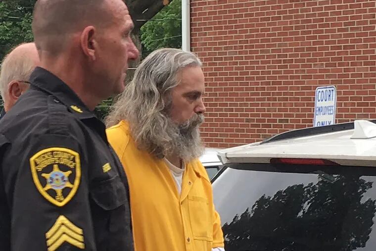 Lee Kaplan is led to a preliminary hearing Tuesday, Aug. 2, 2016, outside Bucks County Magisterial District Judge John I. Waltman's courtroom in Feasterville, Pa.