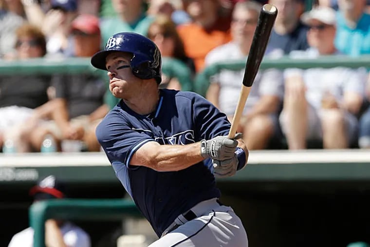 Jayson Nix bats during the first inning of a spring exhibition baseball game against the Atlanta Braves in Kissimmee, Fla., Friday, March 14, 2014. (Carlos Osorio/AP)