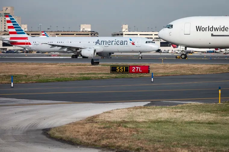 Planes on the runway at Philadelphia International Airport.