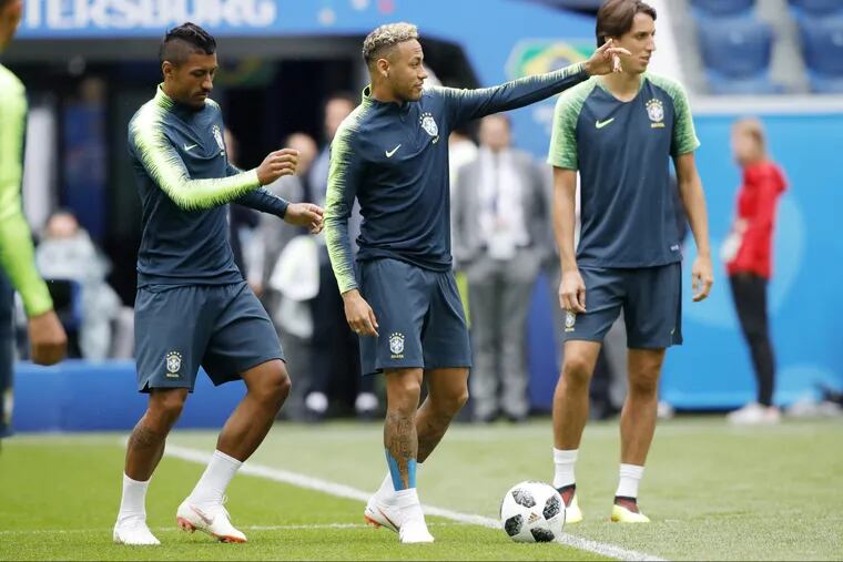 Neymar (center) suffered an injury during Brazil's practice session on Tuesday, but he's expected to be fit to play against Costa Rica.