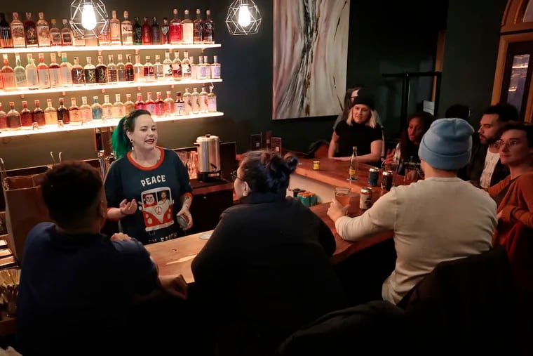 Unity Restaurants dir. of operations Tricia Vasinda works the bar and chats with guests at The Volstead by Unity.