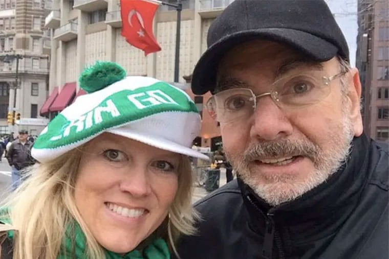 That's Diamond (Neil) celebrating the Emerald Isle at Philly's St. Patrick's Day Parade with the appropriately dressed and named Katie McNeil, also known as Mrs. Diamond, both in town for his concert here Sunday night.