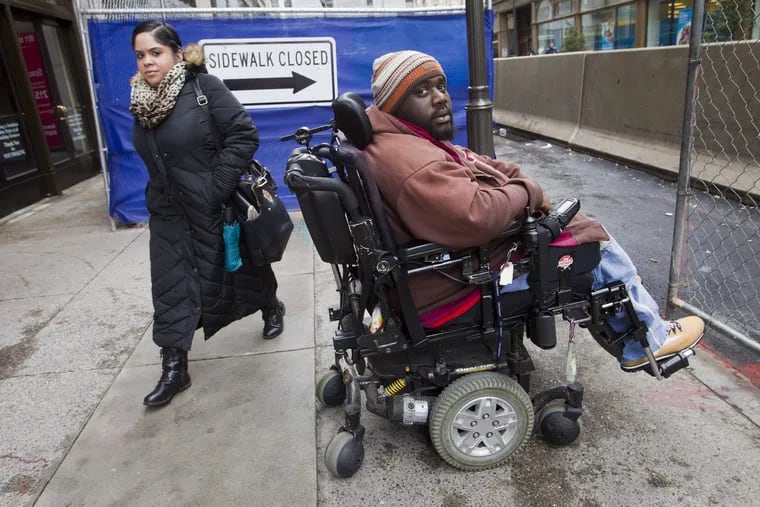 Zachary Lewis of Philadelphia is a paraplegic. He was struck by a car near Island Ave and Lindberg Blvd in southwest Philadelphia. Lewis is independent and get around on his own. Photograph taken on Friday afternoon March 10, 2016 along 8th just north of Market St.  ALEJANDRO A. ALVAREZ / Staff Photographer