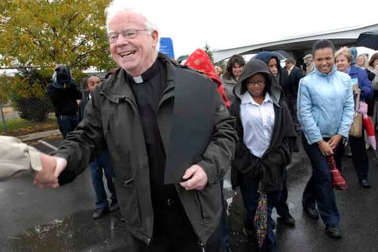 In 2018, Msgr. Michael Doyle greeted well-wishers as Millennium Park near Sacred Heart Church in Camden was renamed Michael J. Doyle Park and Fishing Pier.
