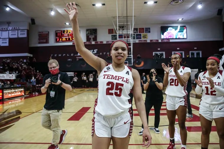 Temple Mia Davis waves to the fans after breaking the high scoring school record against Wichita State  during the 1st quarter in Philadelphia, Wednesday, February 2, 2022.