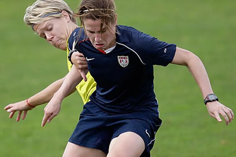 Lori Lindsey (front) helped the U.S. win the Algarve Cup tournament in Portugal. (Armando Franca/AP)