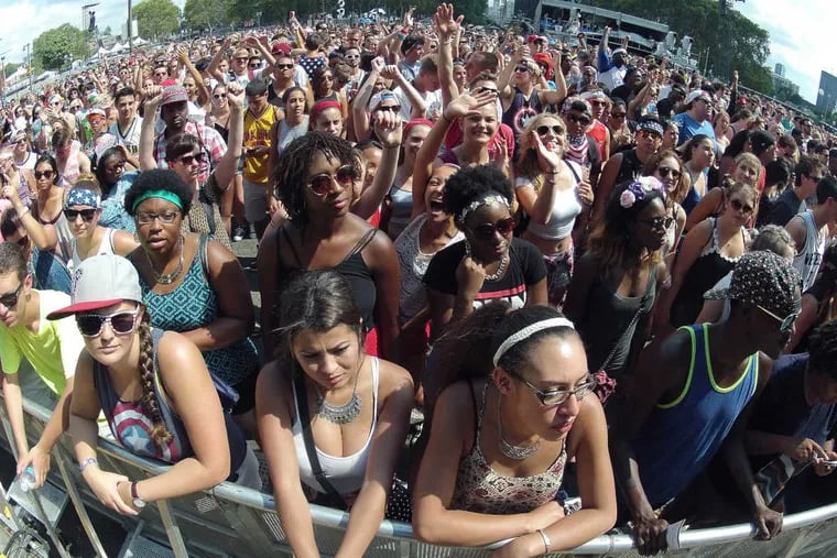 The crowd cheers during the Bleachers&#039; performance at Made in America in Philadelphia on Aug. 31, 2014.