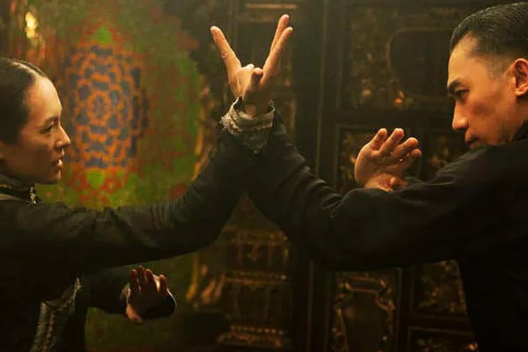 Ziyi Zhang (left), as Gong Er , and Tony Leung, as Ip Man, face off in more ways than one in "The Grandmaster." In real life, Ip Man was credited with training kung fu legend Bruce Lee.