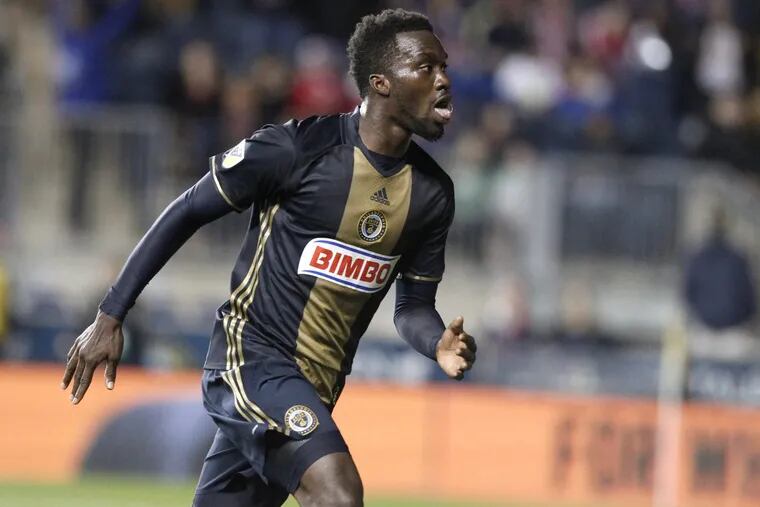 C.J. Sapong of the Union celebrates after the first of his 3 goals against the New York Red Bulls. It was their first victory of the year. CHARLES FOX / Staff Photographer