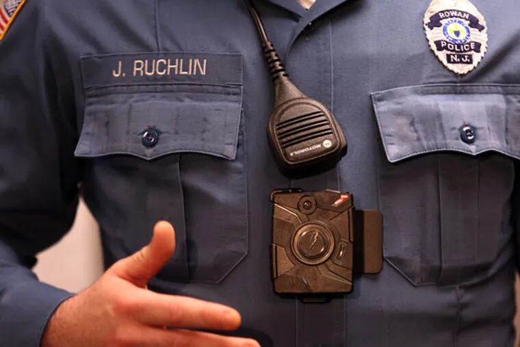 Patrol officer Jeremy Ruchlin wears an AXON body camera Tuesday, April 14, 2015, at Rowan University in Glassboro, N.J. ( DAVID SWANSON / Staff Photographer )