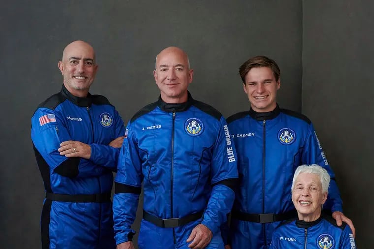 In this photo provided by Blue Origin, from left to right: Mark Bezos, brother of Jeff Bezos; Jeff Bezos, founder of Amazon and space tourism company Blue Origin; Oliver Daemen, of the Netherlands; and Wally Funk, aviation pioneer from Texas.