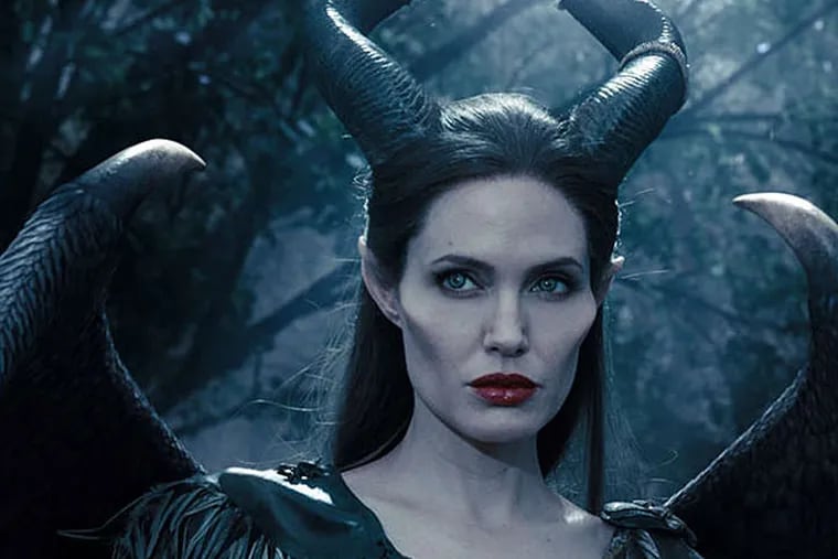 Something wicked: Angelina Jolie has the title role as Sleeping Beauty's cackling nemesis in &quot;Maleficent,&quot; arriving May 30. (Disney)
