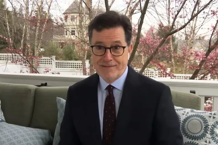 CBS "Late Show" host Stephen Colbert delivers a monologue from the porch of his Montclair, N.J., home. Late-night TV shows first banished their audiences, and then sent their staffs and hosts home, but the hosts have been finding ways to keep going amid this time of social distancing.