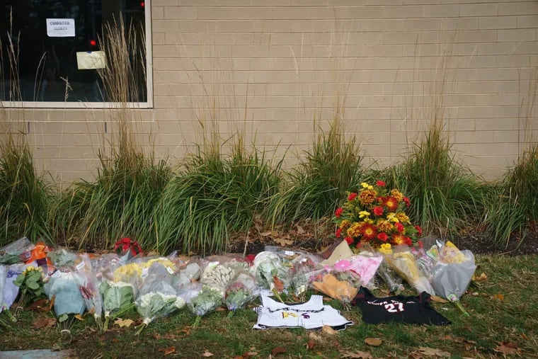 A memorial for principal Sean Hughes at Lower Merion High School.
