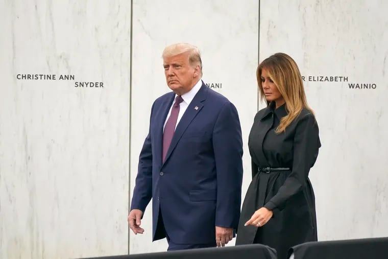 President Donald Trump and first lady Melania Trump arrive at a 19th anniversary observance of the Sept. 11 terror attacks, at the Flight 93 National Memorial in Shanksville, Pa., on Friday.