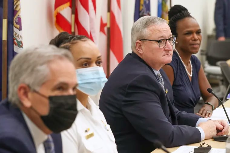 Mayor Jim Kenney sits with city officials including (from left) District Attorney Larry Krasner, Police Commissioner Danielle Outlaw, and U.S. Department of Health and Human Services regional director Ala Stanford.