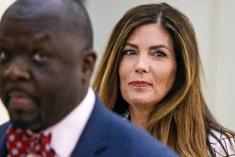 Attorney General Kathleen Kane walks to the courtroom during a short recess on the second day of her trial at the Montgomery County Courthouse in Norristown on Tuesday, Aug. 9, 2016.