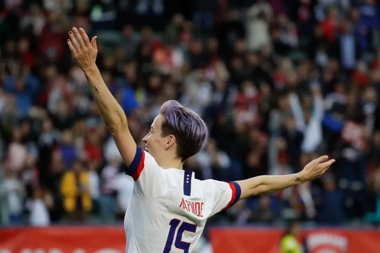Megan Rapinoe celebrates after finishing off the United States' win over Canada.