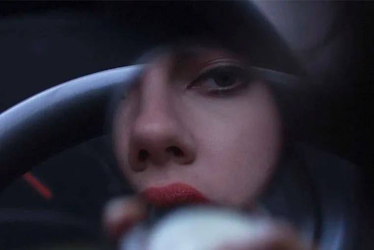Scarlett Johansson is a dangerous woman in the eerie, experimental &quot;Under the Skin&quot; from Jonathan Glazer.