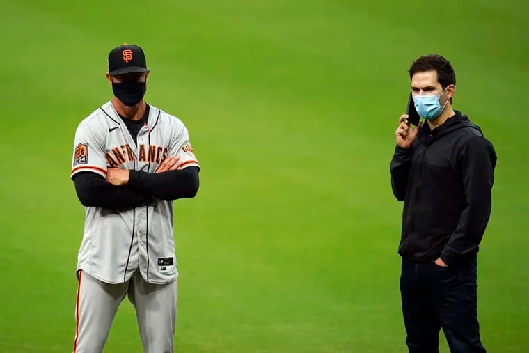 San Francisco Giants manager Gabe Kapler, left, will return to Citizens Bank Park on Monday night for the first time since getting fired by the Phillies 18 months ago.