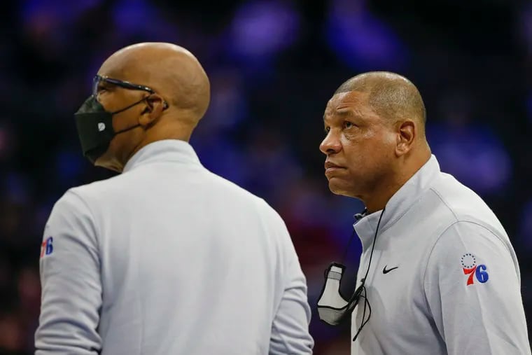 Sixers coach Doc Rivers (right) and assistant coach Sam Cassell (left) during the first half of Tuesday night's home game against New Orleans.