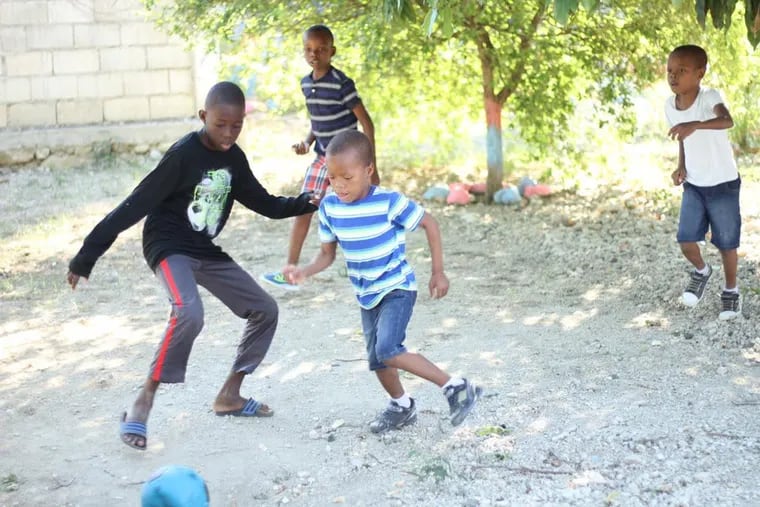 The children of Love Orphanage playing soccer. The orphanage focuses on nurturing the children's emotional, mental and physical needs.
