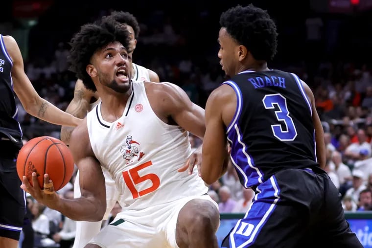 Miami forward and leading rebounder Norchad Omier (left) is pressured by Duke guard Jeremy Roach during a game in Florida last month. The top-seeded Hurricanes have the second-shortest odds to win this week’s ACC Tournament, trailing only Duke. (Photo by Megan Briggs/Getty Images)